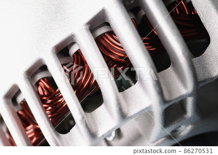 Electric motor stator with winding coil, view of inside of electric induction motor 86270531