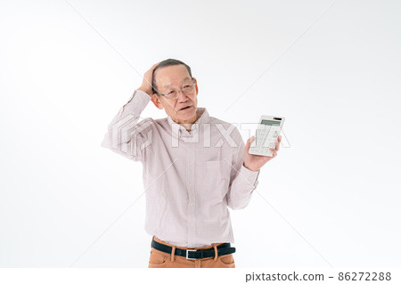 Senior man worried about having a calculator Senior man worried about having a calculator 86272288