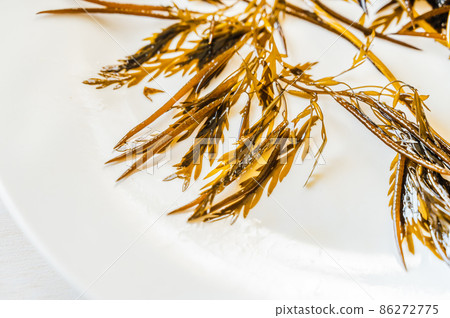 Raw gibasa on a white plate 86272775