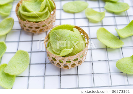 Prawn crackers on white background. Shrimp crispy rice snack Prawn crackers on white background. Shrimp crispy rice snack 86273361