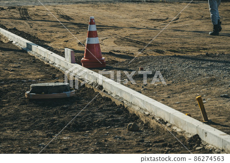 Curb installation work: Concrete blocks 86274563