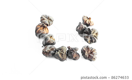 Isolated dried brown teak seeds on white background Isolated dried brown teak seeds on white background 86274633
