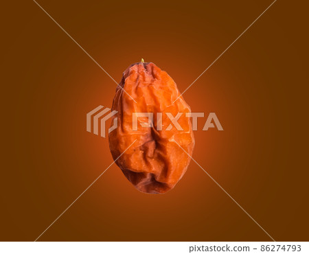 Isolated blur rotten brown Ziziphus Mauritiana lam on brown background Isolated blur rotten brown Ziziphus Mauritiana lam on brown background 86274793