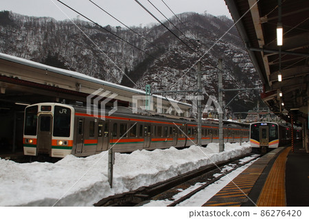 Winter water train station and the E 129 line of Joetsu line 86276420