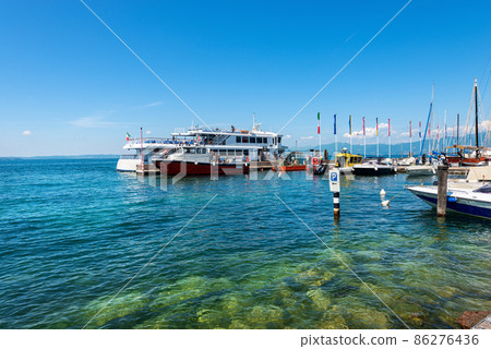 Ferry Boat Station of the small Bardolino village - Lake Garda Veneto Italy Ferry Boat Station of the small Bardolino village - Lake Garda Veneto Italy 86276436
