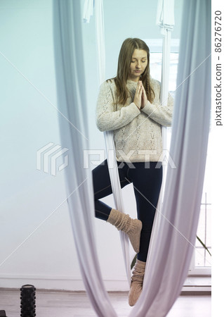 girl training in yoga studio 86276720