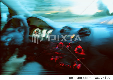Blurred unfocused view through the moving car windscreen. Glitch retro effect. 86278199