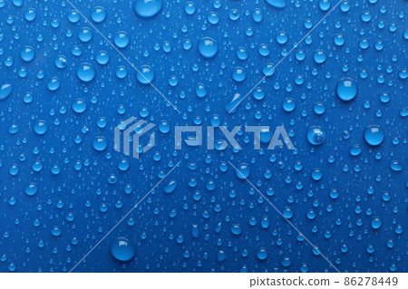 Water drops on blue background, top view Water drops on blue background, top view 86278449