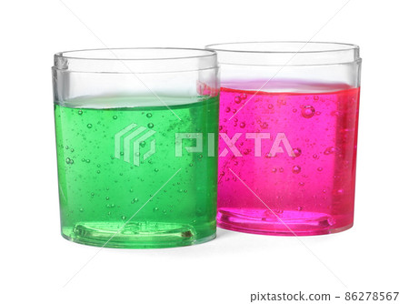 Colorful slimes in plastic containers isolated on white. Antistress toy Colorful slimes in plastic containers isolated on white. Antistress toy 86278567