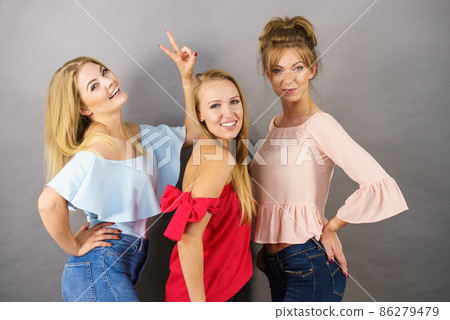 Positive female friends having fun Positive female friends having fun 86279479