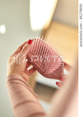 Problem hair loss concept, losing hair on hairbrush 86279690