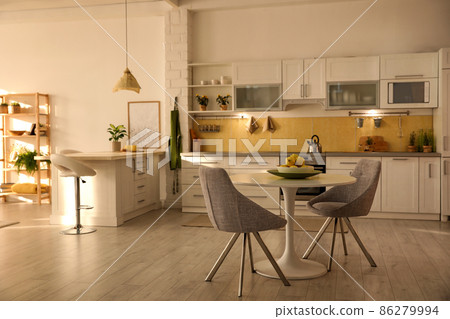Modern kitchen interior with stylish white furniture Modern kitchen interior with stylish white furniture 86279994