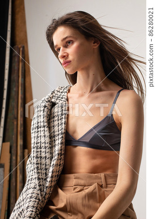 Young slim woman in studio Young slim woman in studio 86280021