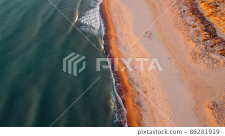 Aerial view of seashore and wild sandy beach. 86281919