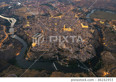 Drone point of view old town of Toledo at dusk. Spain Drone point of view old town of Toledo at dusk. Spain 86282953