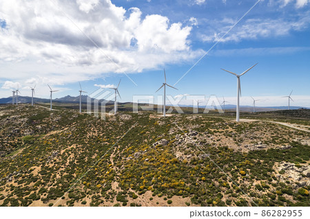 Drone point of view moving turbines of windmills. Spain Drone point of view moving turbines of windmills. Spain 86282955