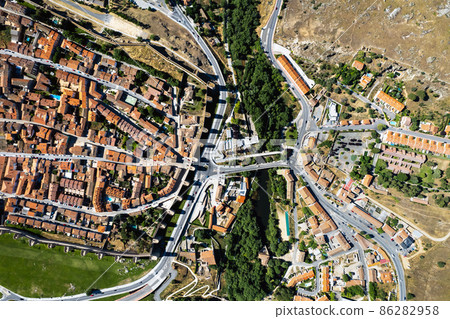 Drone point of view Avila cityscape rooftops. Spain 86282958