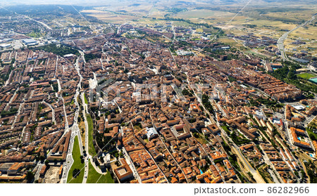Drone point of view Avila cityscape rooftops. Spain 86282966