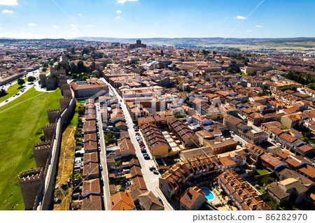 Drone point of view Avila cityscape rooftops. Spain 86282970