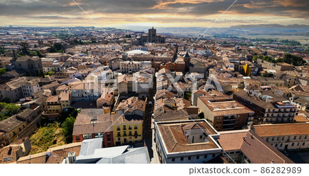 Drone point of view Avila cityscape rooftops. Spain 86282989