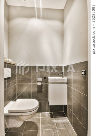 Interior of small clean restroom in miniature style Interior of small clean restroom in miniature style 86283095