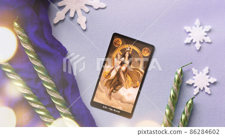 Tarot cards in Christmas decoration. Esoteric, fortune telling and predictions 86284602