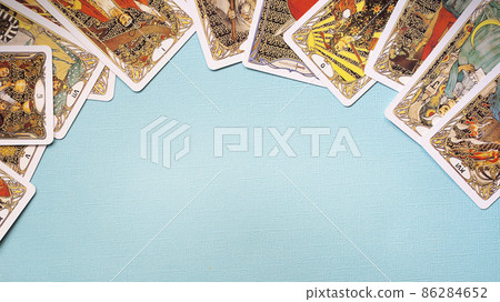 View of Golden tarot cards Frame on the Blue background, esoteric concept,  86284652