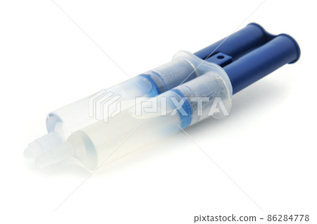 Two-component epoxy adhesive on a white background 86284778