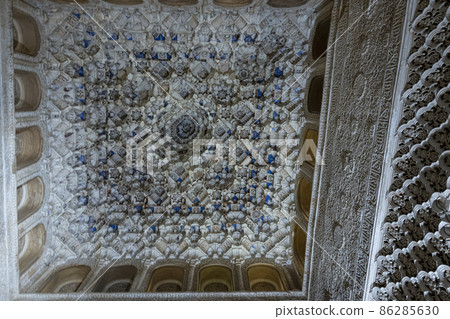 Alhambra decoration details of the ceilings of the Alhambra palaces with the few remaining original colors. Grenade. Andalusia. Spain. Alhambra decoration details of the ceilings of the Alhambra palaces with the few remaining original colors. Grenade. Andalusia. Spain. 86285630