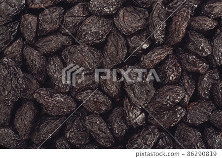 Dry fruit prunes top view for background. Dry fruit prunes top view for background. 86290819