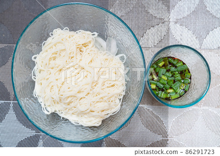 A photo of somen noodles that looks delicious. Image of summer meal. 86291723