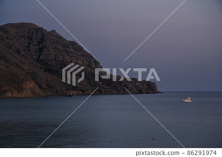 white motor yacht stands in a bay on the sea 86291974