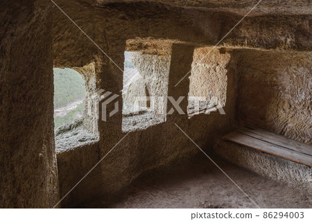 Inside of cave room in cave city Chufut-Kale in Bakhchysarai, Crimea Inside of cave room in cave city Chufut-Kale in Bakhchysarai, Crimea 86294003