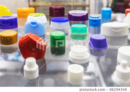 plastic lids of different shapes and purposes in different colors plastic lids of different shapes and purposes in different colors 86294349
