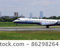 Ibex Bombardier aircraft landing at Osaka International Airport 86298264