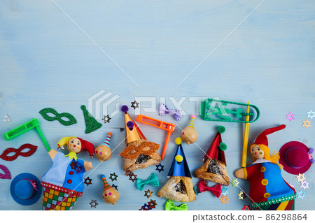 Purim, jewish carnival holiday celebration background. Top view, flat lay Purim, jewish carnival holiday celebration background. Top view, flat lay 86298864