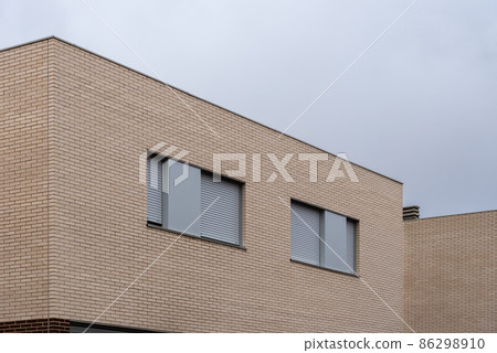 Contemporary row houses with brick facade in Spain 86298910