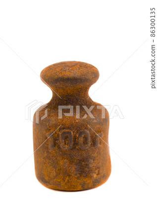 isolated rusty 100 gramme weight isolated rusty 100 gramme weight 86300135