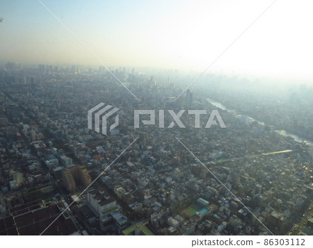 Tokyo cityscape and buildings that are cloudy in the distance due to gas Tokyo cityscape and buildings that are cloudy in the distance due to gas 86303112