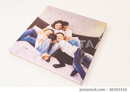the pages of a photobook with a beautiful pregnancy photo shoot. the pages of a photobook with a beautiful pregnancy photo shoot. 86303416