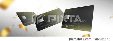Black plastic credit cards and gold ribbons 86303548