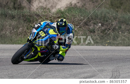 10-05-2020 Ropazi, Latvia Motorcycle practice leaning into a fast corner on track 86305357