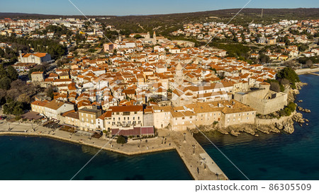 Aerial view of historic Adriatic town of Krk , Island of Krk, Kvarner bay of Adriatic sea, Croatia, Europe Aerial view of historic Adriatic town of Krk , Island of Krk, Kvarner bay of Adriatic sea, Croatia, Europe 86305509