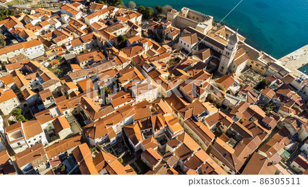 Aerial view of historic Adriatic town of Krk , Island of Krk, Kvarner bay of Adriatic sea, Croatia, Europe Aerial view of historic Adriatic town of Krk , Island of Krk, Kvarner bay of Adriatic sea, Croatia, Europe 86305511
