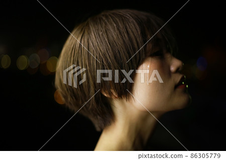 A woman who sheds tears A woman who sheds tears 86305779