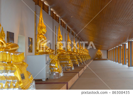 Row of buddha statues. Wat Dhammayan temple, Phetchabun. Famous tourist attraction landmark. Thai History architecture. 86308435