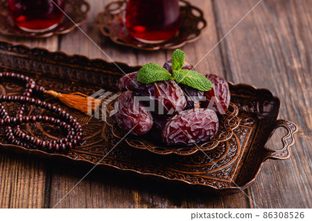 Dried dates fruit. Popular fruit of Ramadan. Dried dates fruit. Popular fruit of Ramadan. 86308526