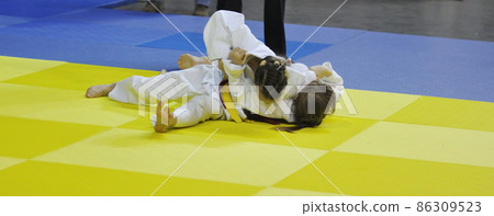 Girls compete in Judo Girls compete in Judo 86309523