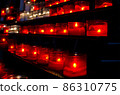 Prayer candles in church 86310775