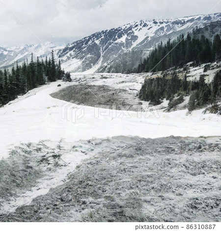 Panoramic Winter Landscape With Snow Covered Mountains And Pine Trees Panoramic Winter Landscape With Snow Covered Mountains And Pine Trees 86310887